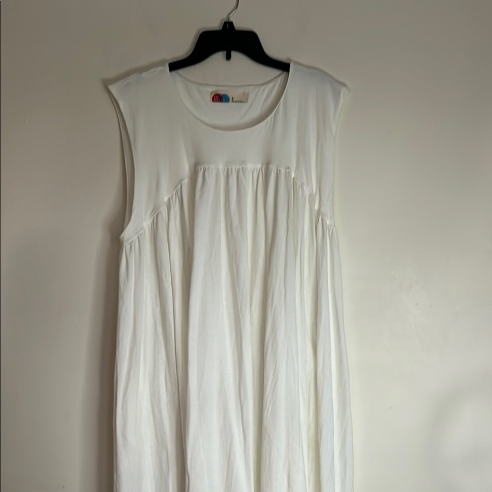 FP Madelyn Midi Beach Elegant White Sleeveless Dress high low and side pockets. - Picture 14 of 16
